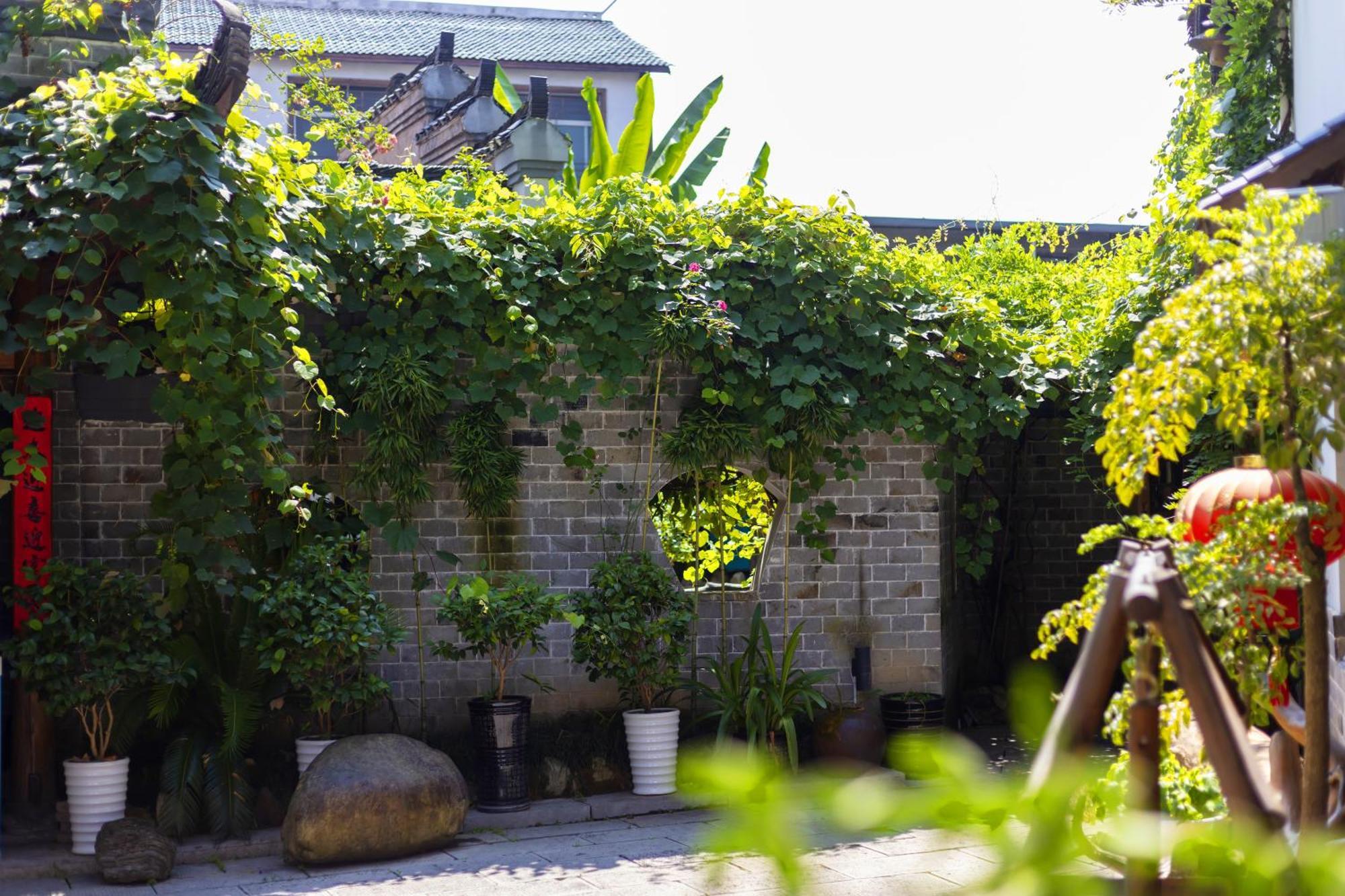 Butterfly Flowers Inn Zhangjiajie Exterior photo